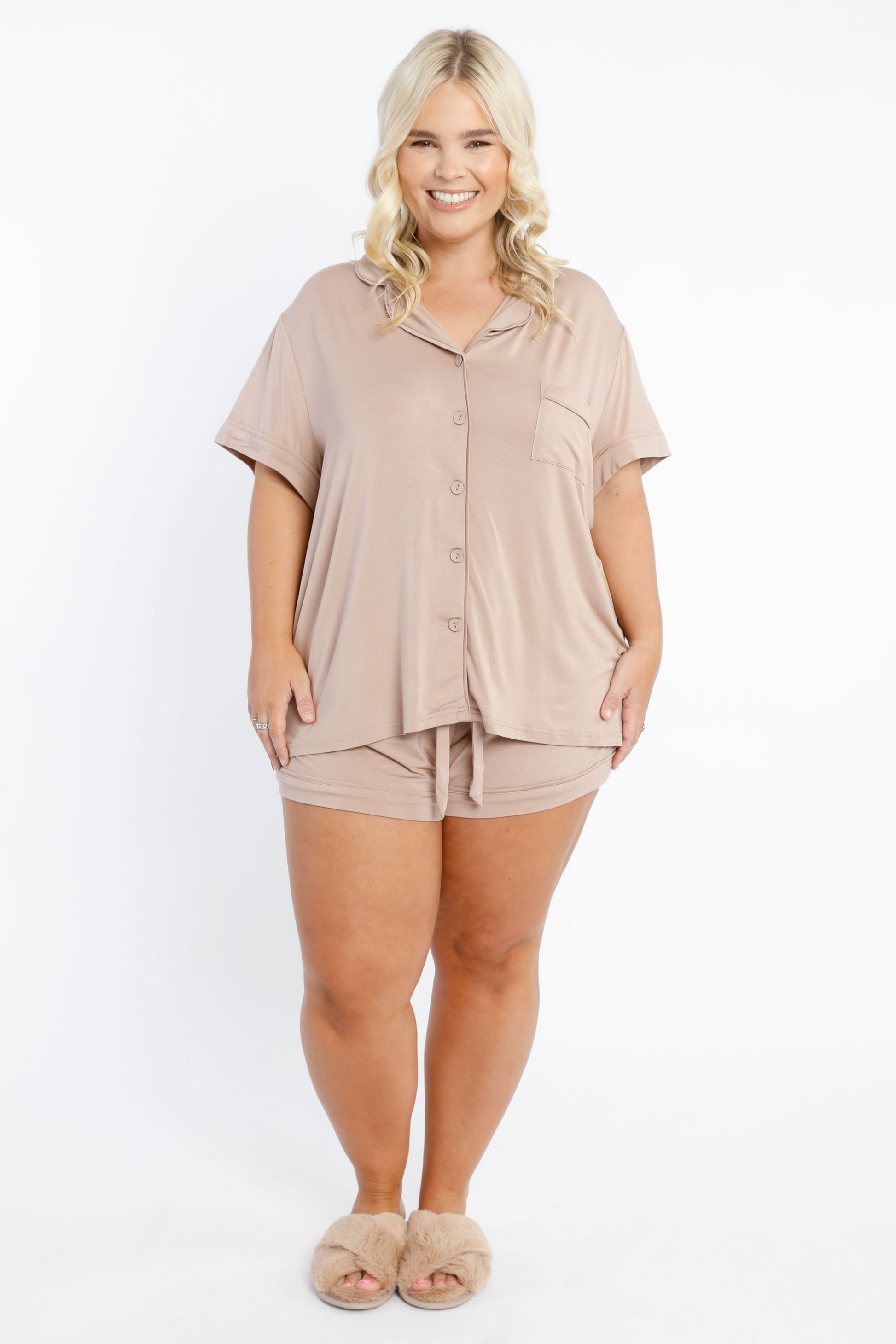 Ready for bed? Relax in style and slip into our short sleeve pyjama top in a lightweight, cooling Jersey fabric. Featuring short sleeves, collar, front pocket at left breast and classic buttons centre front. It is a relaxed style warm nights cool and comfortable feel. Pair with the PJ shorts for the perfect sleep set.